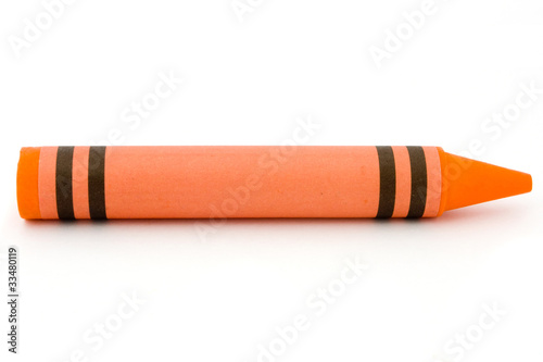 Siingle orange crayon isolated on white photo
