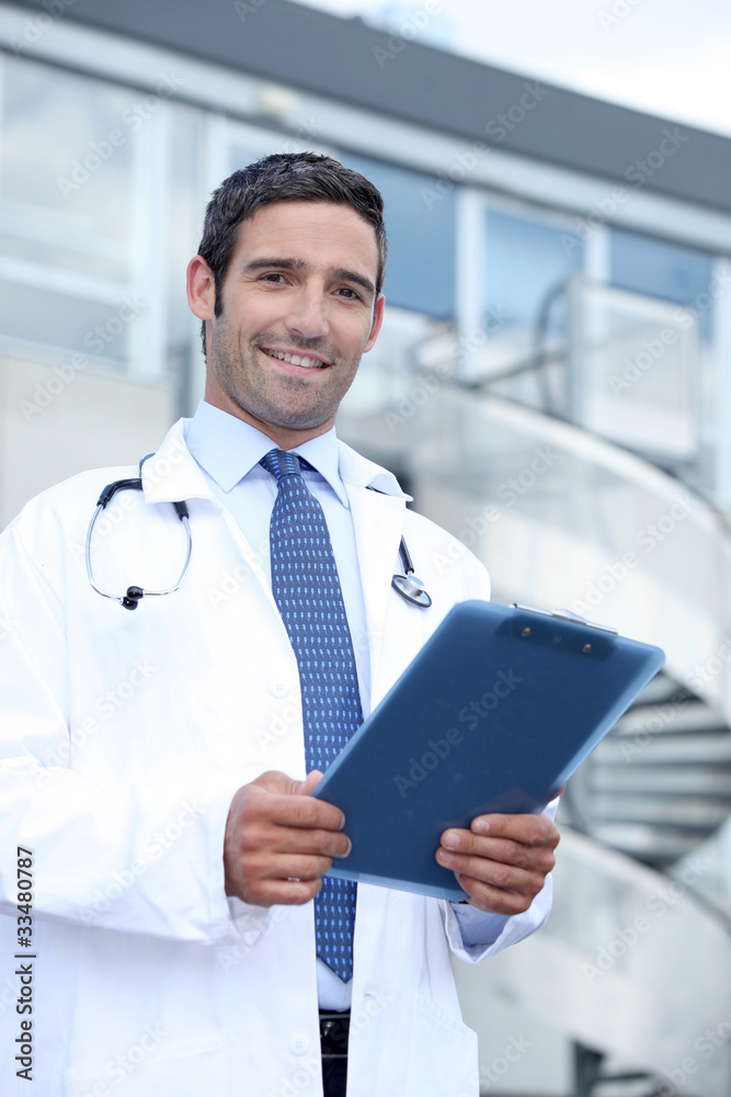 Doctor with clip-board