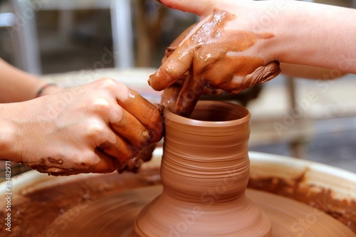 clay potter hands wheel pottery work workshop teacher