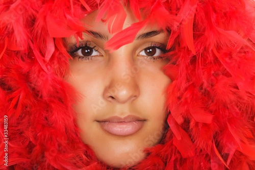woman portrait in red feather