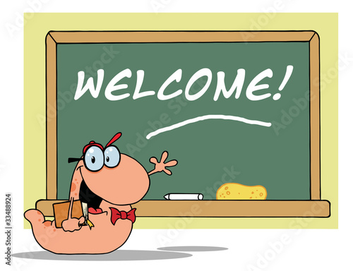 Student Bookworm By A Welcome Classroom Chalkboard