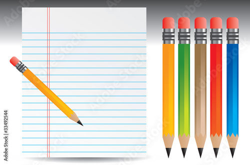 Notebook paper and various colored pencils