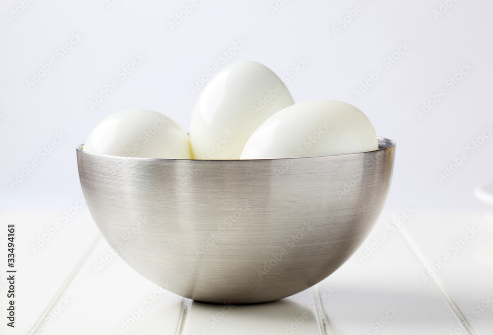 Peeled hard boiled eggs