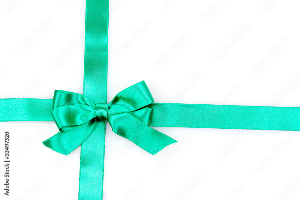 Green  ribbon and bow isolated on white background