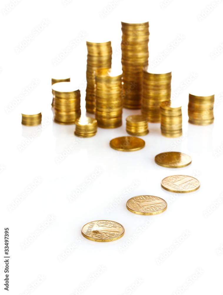 Many coins in columns isolated on white. Ukrainian coins Many coins in columns isolated on white. Ukrainian coins