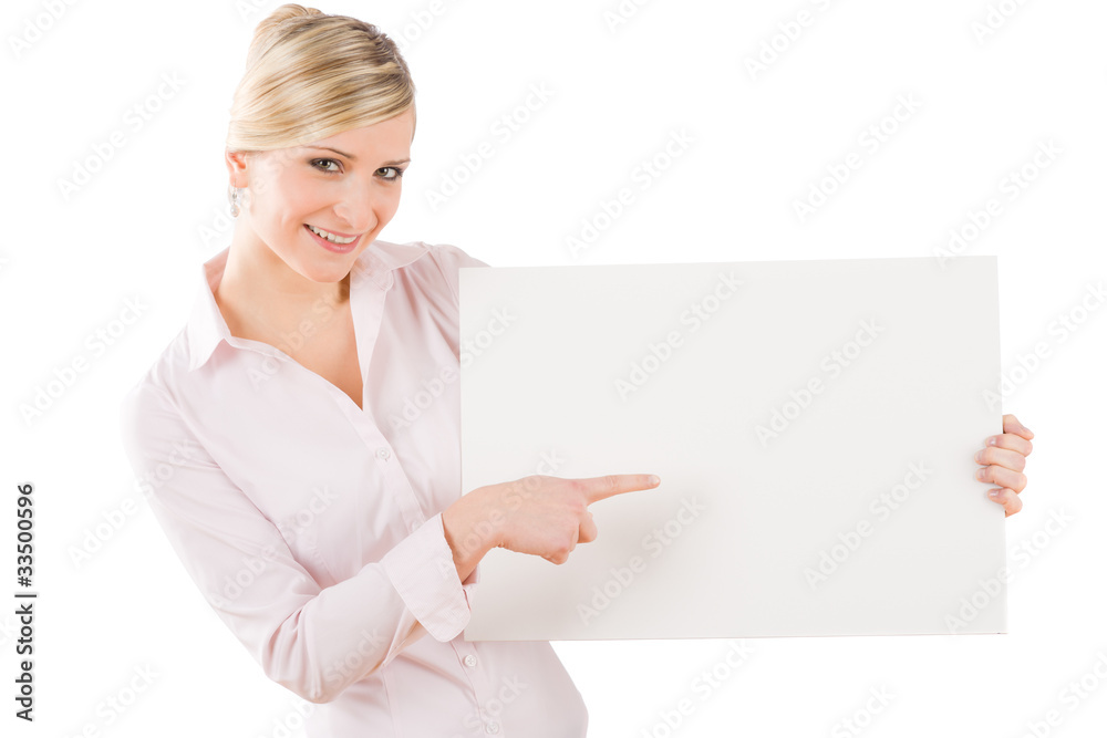 Businesswoman pointing aside at white banner Businesswoman pointing aside at white banner