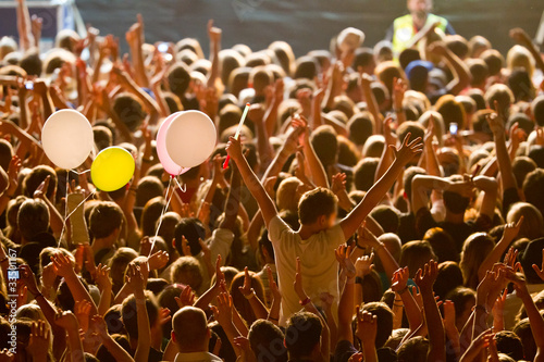 yellow lighted arded crowd photo