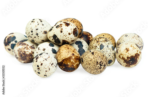 Quail eggs isolated on white the background