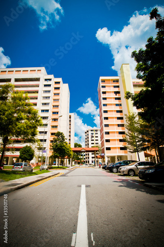 High rise flats against a blue sky © natsora