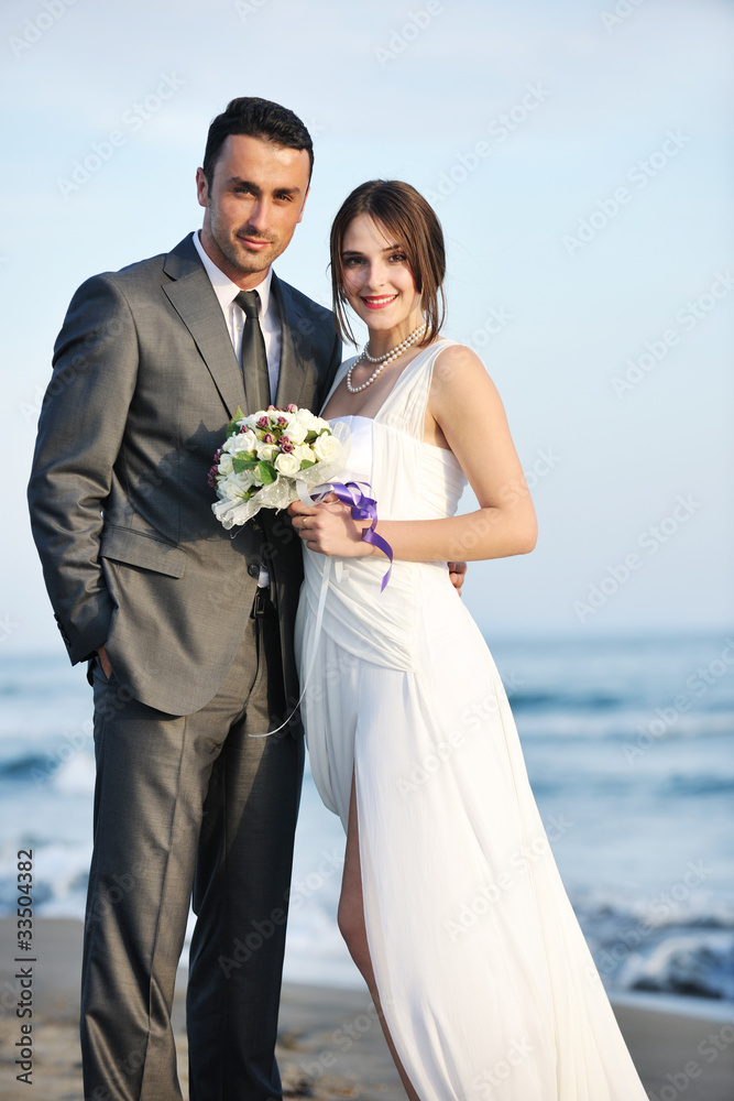 romantic beach wedding at sunset