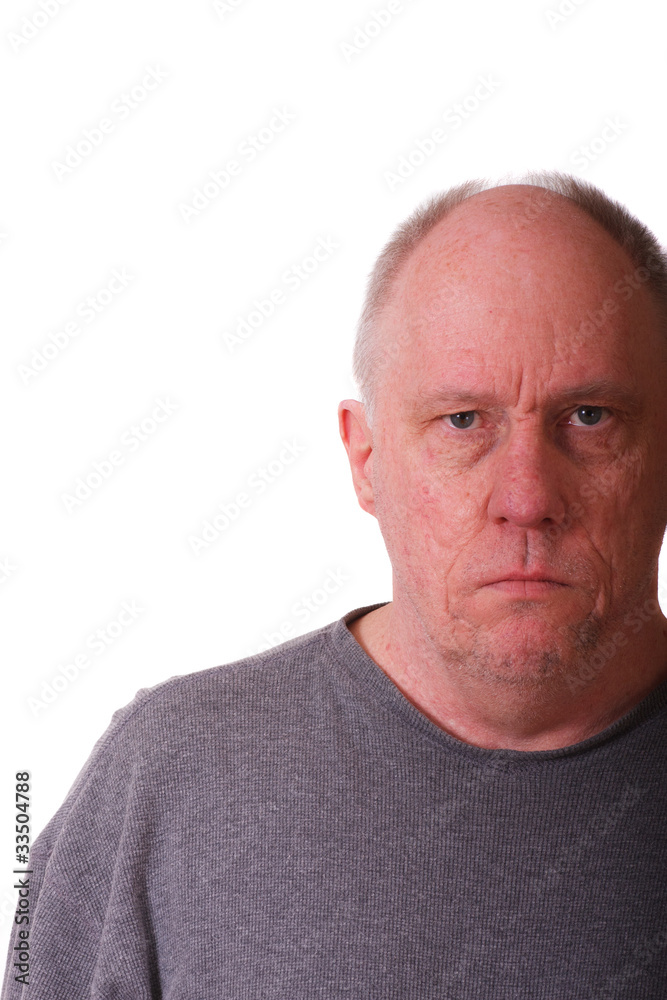 Obraz premium Older Balding Man with grumpy expression