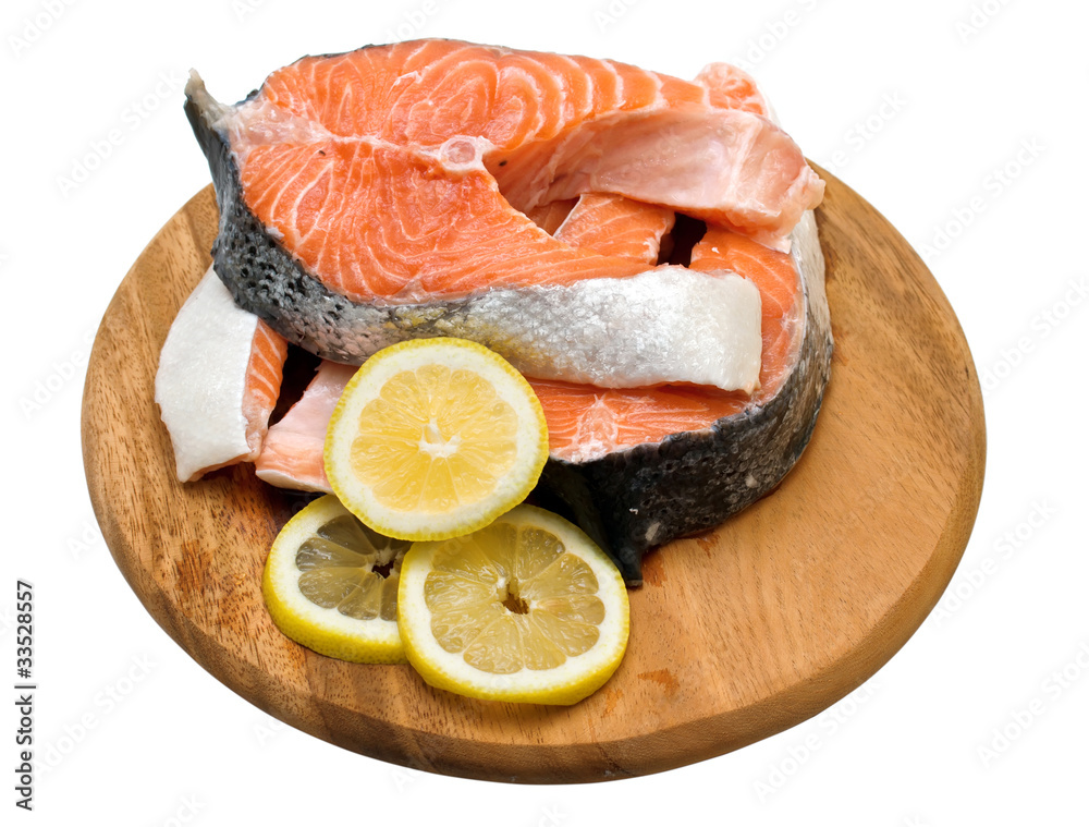 Salmon fillets with lemon on a white background Salmon fillets with lemon on a white background