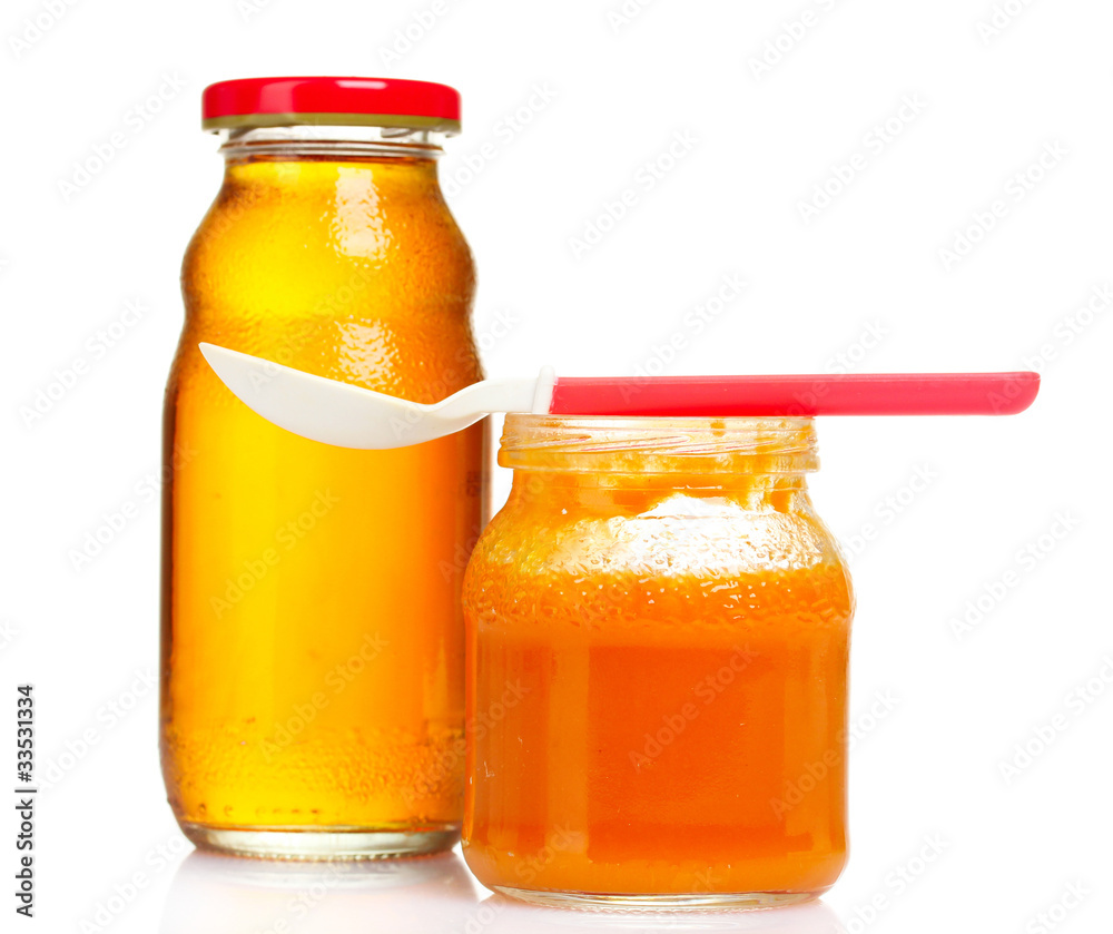 baby food and spoon isolated on white baby food and spoon isolated on white