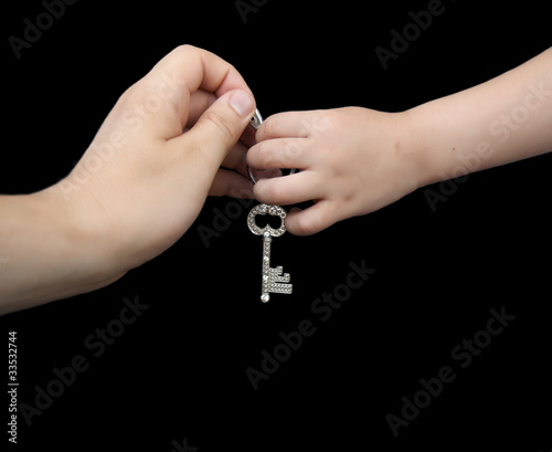 Father giving key to son