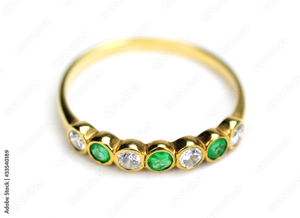 Obraz premium Ring mit Brillanten und Smaragden