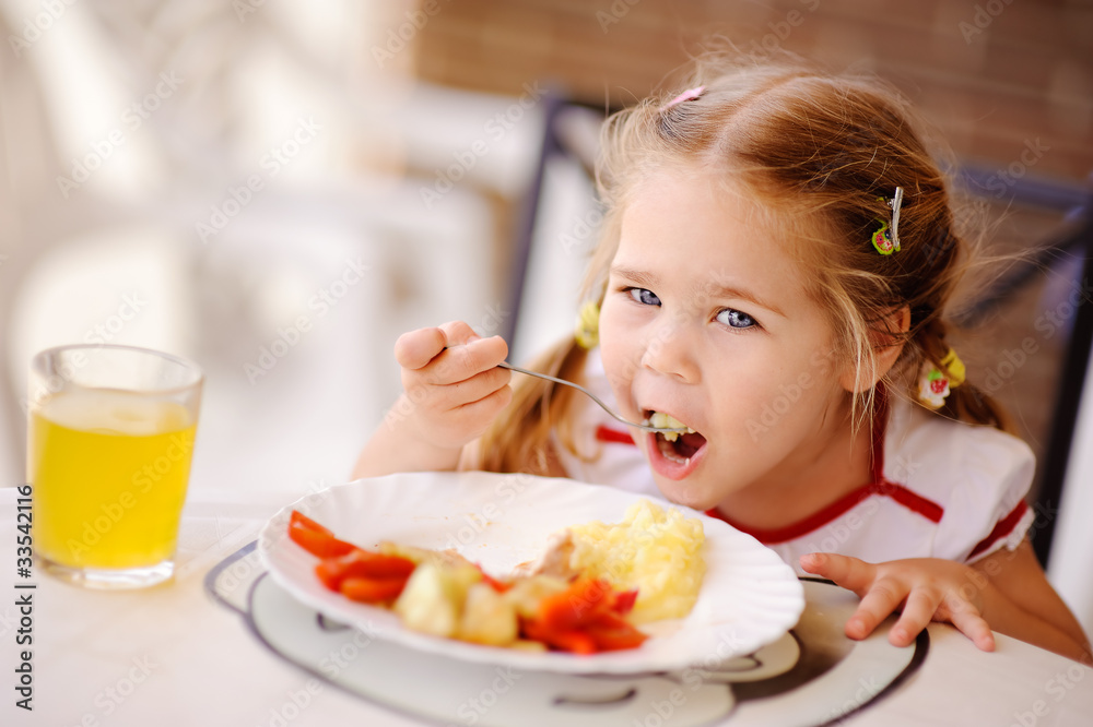toddler girl have a breakfast outdoor toddler girl have a breakfast outdoor