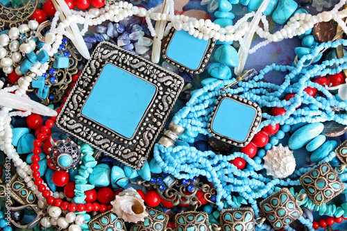 Background with turquoise, shells and pearls
