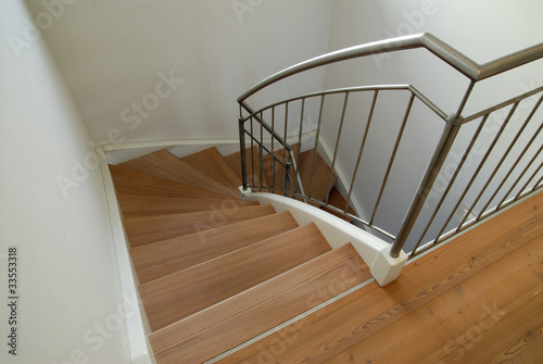 Modern wooden stairway in house