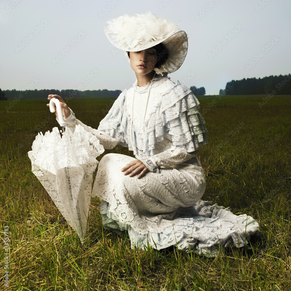 Naklejka premium Woman in vintage dress