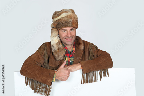 portrait of a man in trapper costume photo