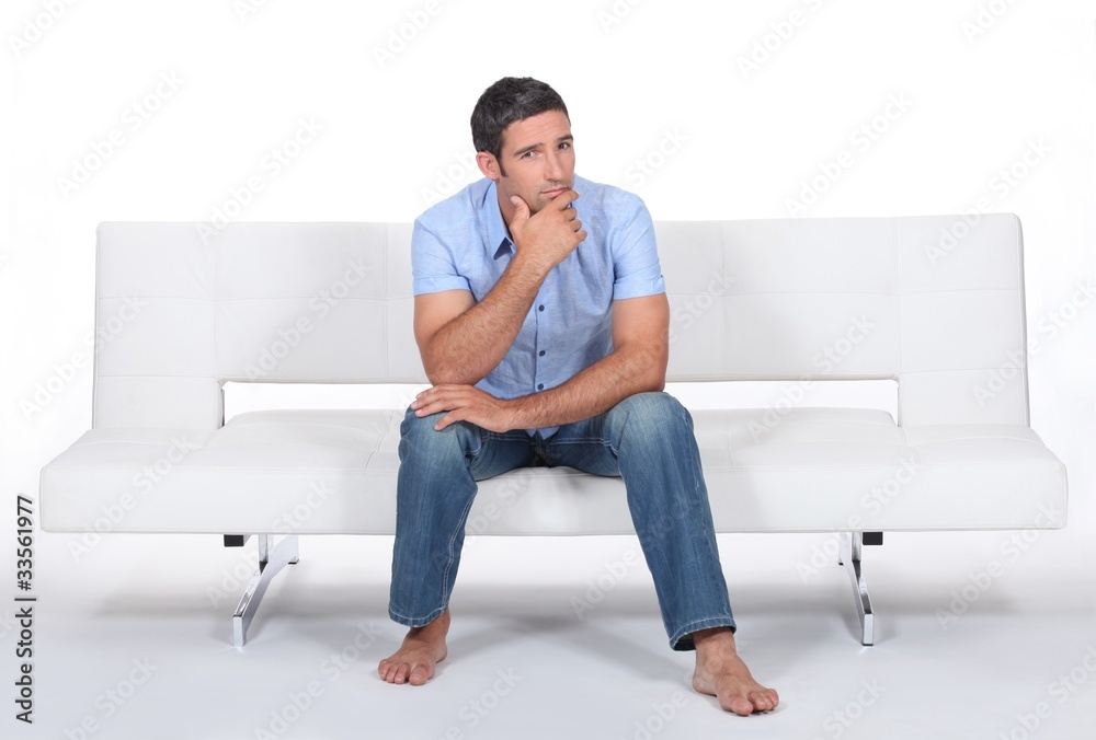 Man sitting on a sofa