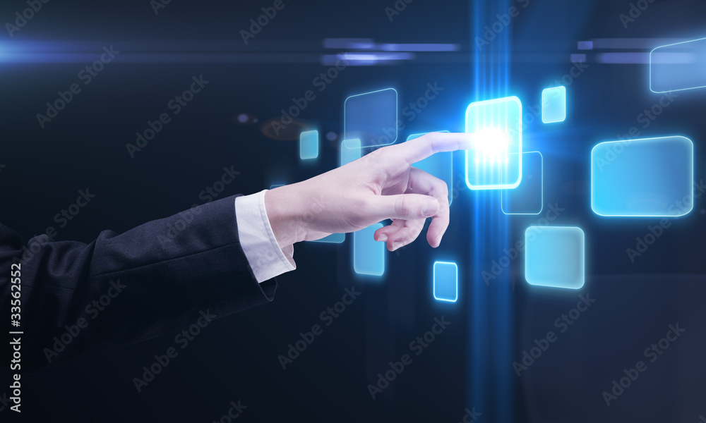 hand pushing a button on a touch screen interface hand pushing a button on a touch screen interface