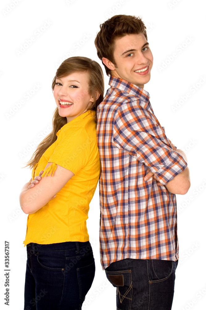 Couple standing back to back