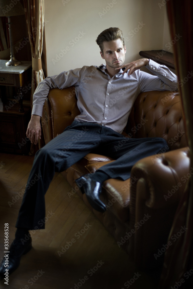 Fashionable man sitting Fashionable man sitting