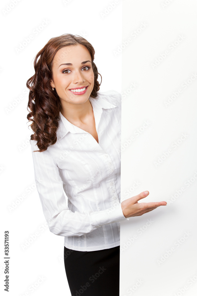 Smiling businesswoman showing blank signboard, isolated Smiling businesswoman showing blank signboard, isolated
