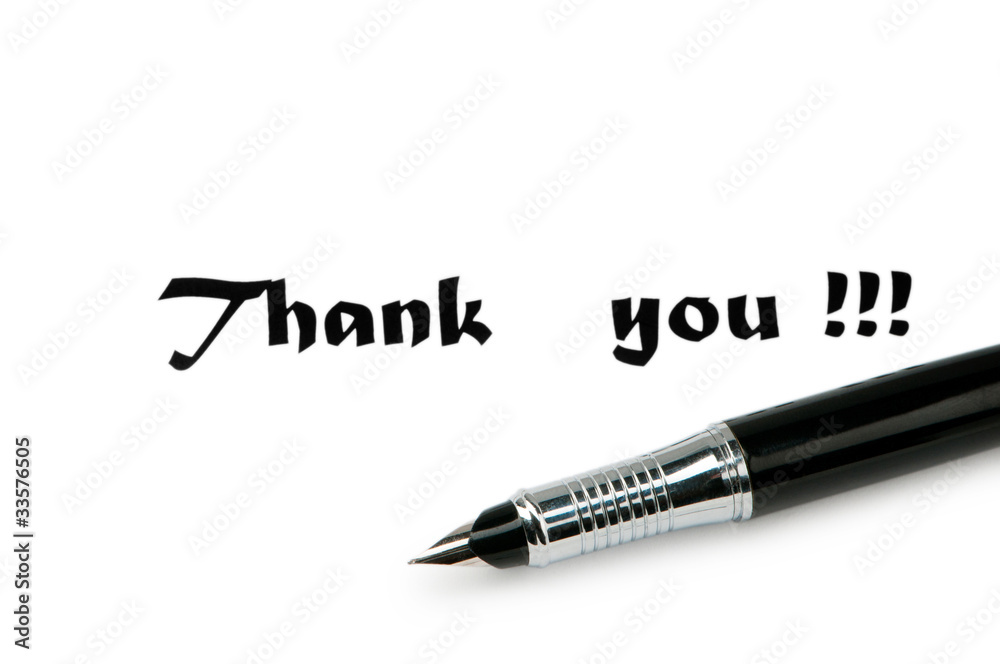Thank you message and pen on white Thank you message and pen on white