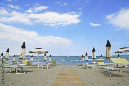 Beach umbrellas and deckchairs for summer vacations