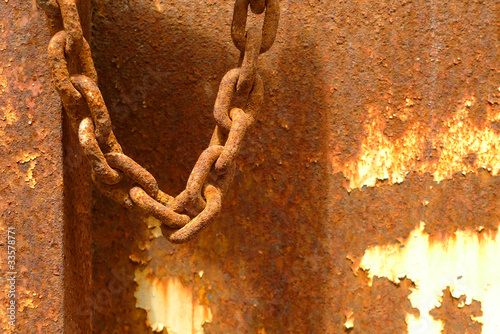 Rusty chain over rusty background