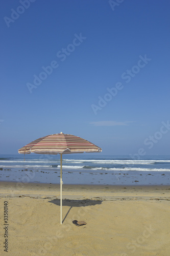 Beach Umbrella and Sandals  copyspace
