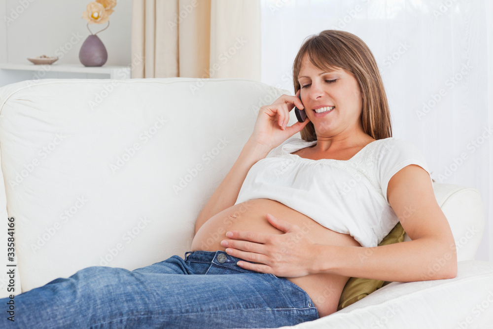 Pregnant woman phoning Pregnant woman phoning