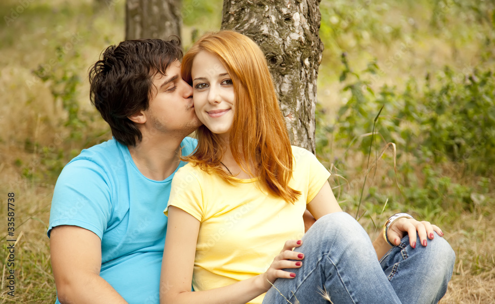 Couple at the park in summer day. Couple at the park in summer day.