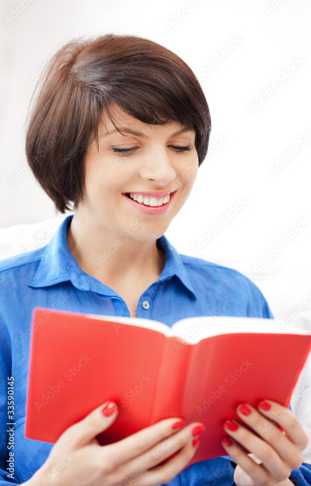 happy and smiling woman with book happy and smiling woman with book