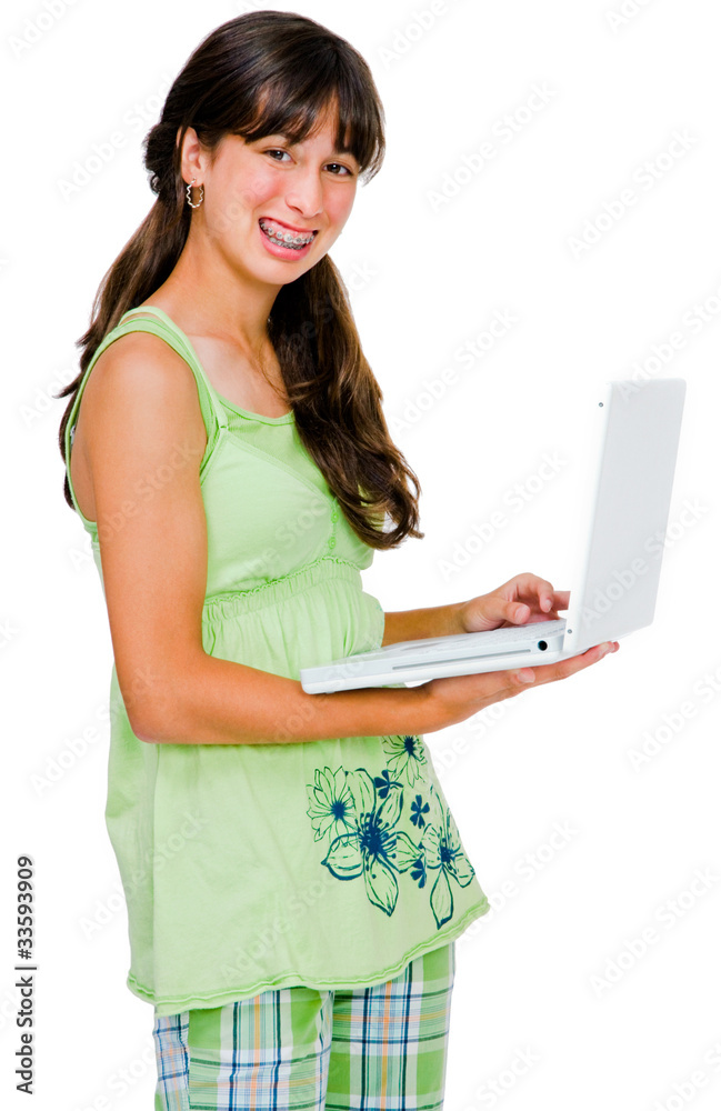 Latin American teenage girl using a laptop Latin American teenage girl using a laptop