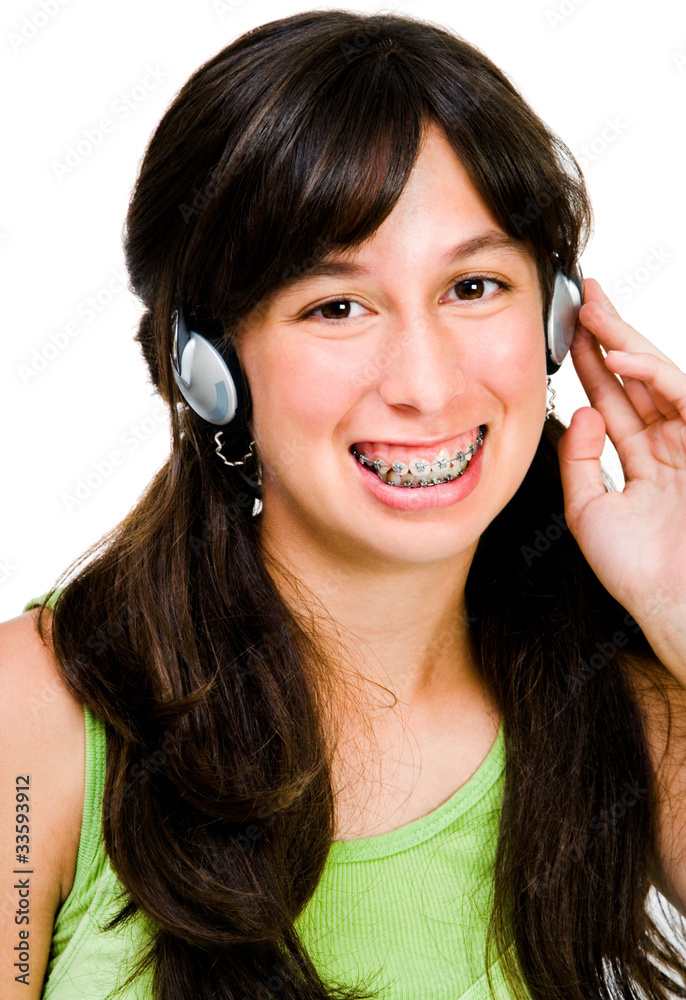 Naklejka premium Teenage girl listening music