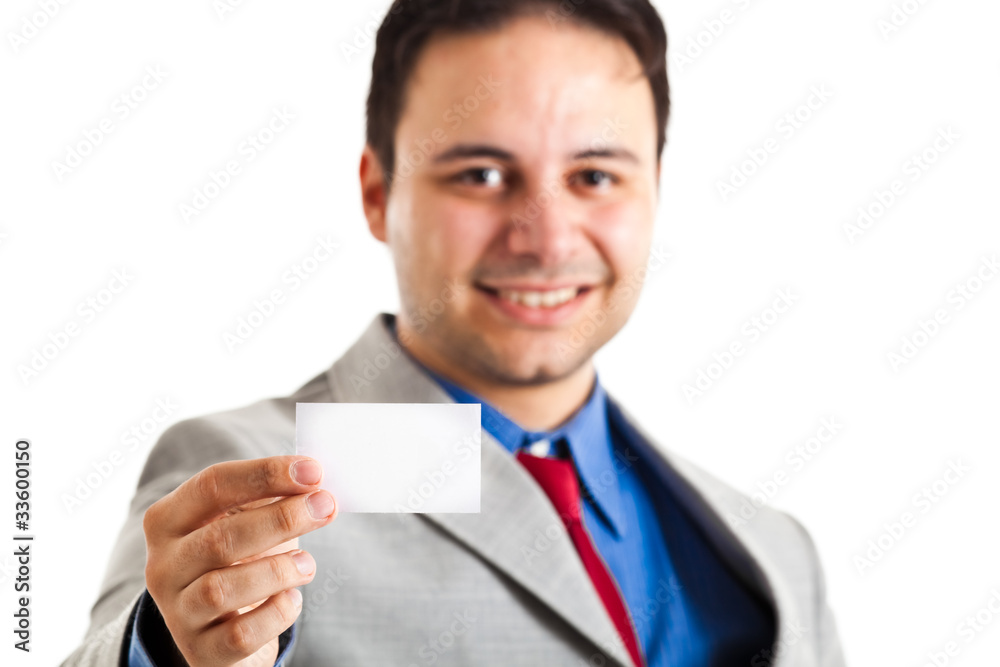 Empty business card in a businessman hand Empty business card in a businessman hand