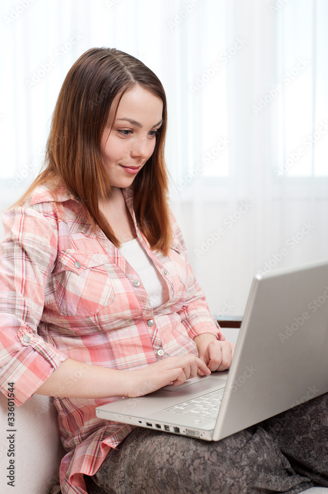 woman working on laptop at home woman working on laptop at home