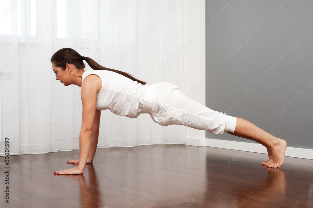 Fototapeta premium young woman doing exercise
