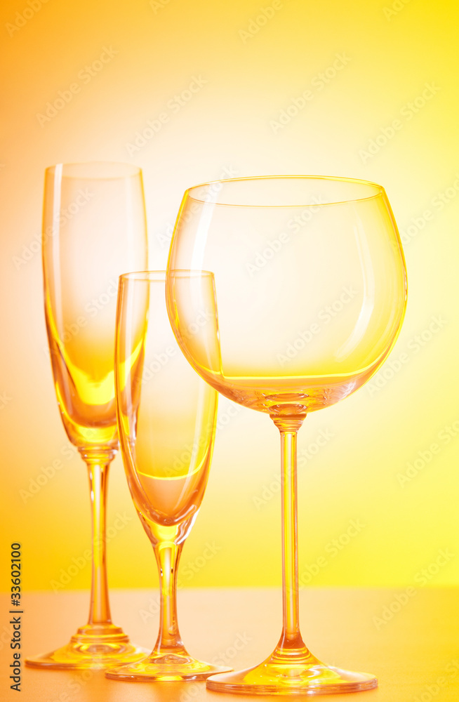 Wine glasses on the gradient background