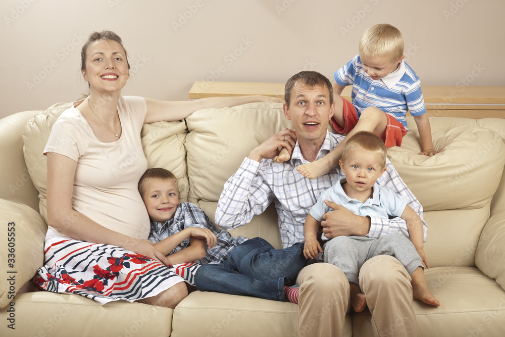 Family sitting on the sofa