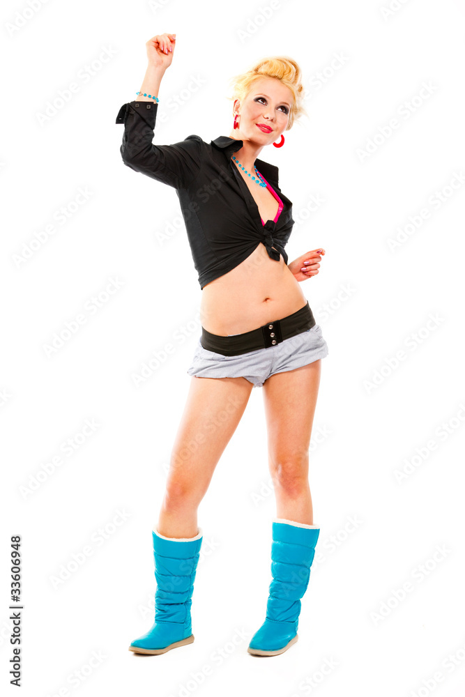 Full length portrait of dancing young girl isolated on white.