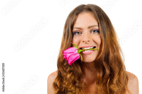 girl holding a rose in her mouth