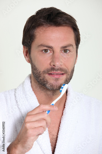 portrait of a man with toothbrush