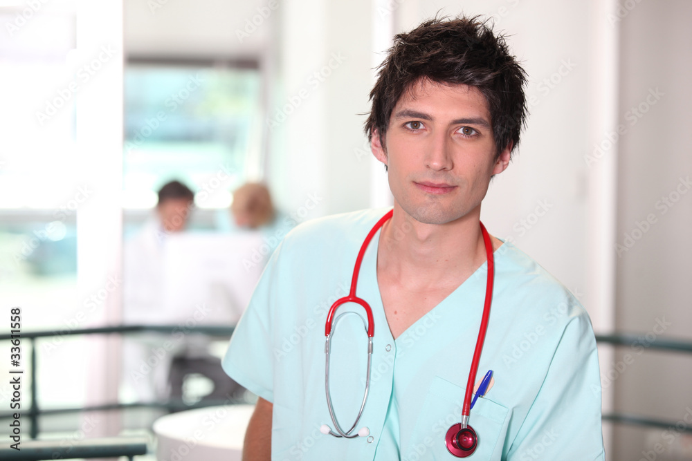 Hospital medic in scrubs with stethoscope Hospital medic in scrubs with stethoscope