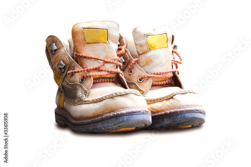 Old leather shoes isolated on white background