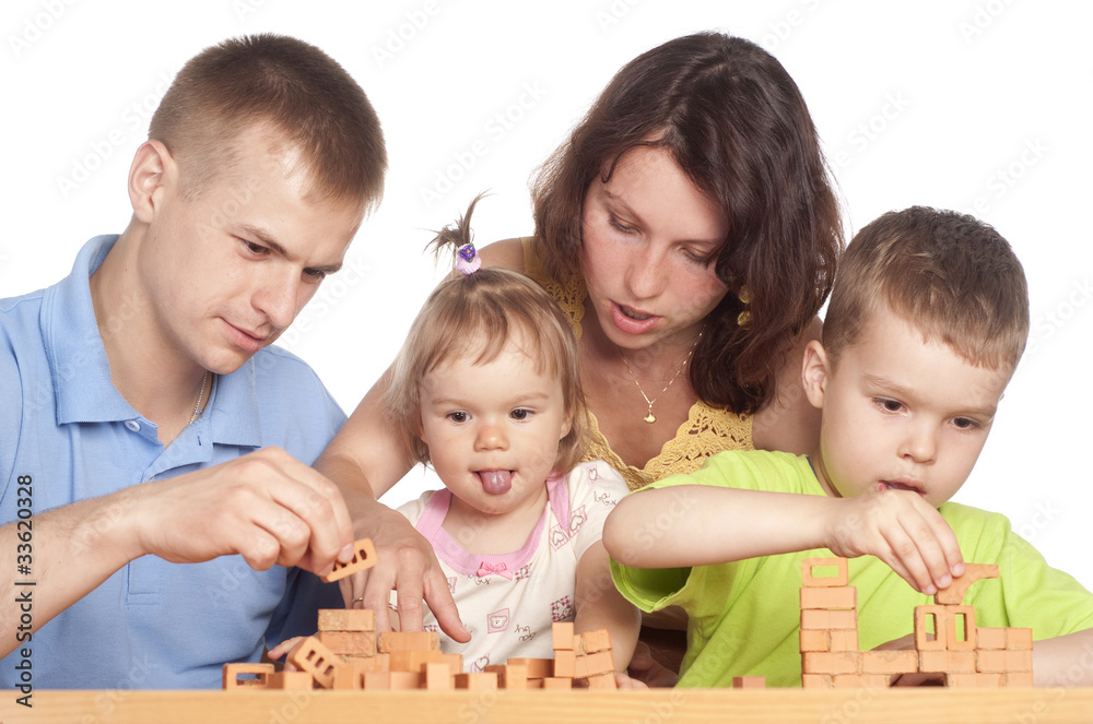 family plays at table family plays at table