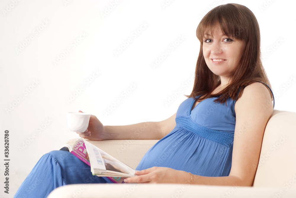 pregnant girl drinks tea